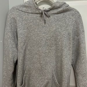 grey womans sweatshirt